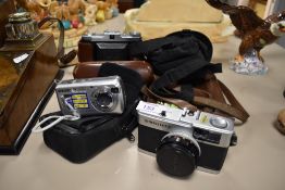 A selection of photographic equipment and cameras including Olymups 35