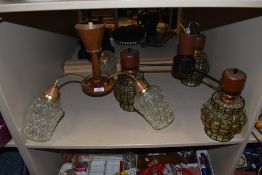 Two 1970's atomic style three branch light shades with matching glass shades