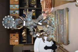 A rococo styled PAOR Spanish bronzed mantle clock having