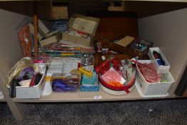 A selection of sewing and haberdashery items including needle work interest