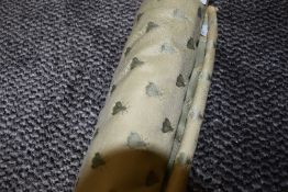 A roll of vintage with a bumble bee design