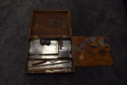 A portable oak cased artist paint and brush set including oak artist palette by Winsor and Newton