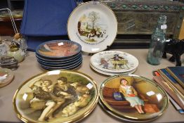 A selection of ceramic display plates and similar including Norman Rockwell