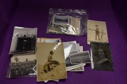 A selection of postcards and photographs including Manx TT motorcycle interest