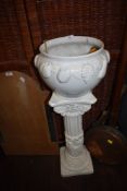 A roman style jardiniere base and similar white glaze planter