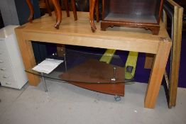 A modern part oak dining table