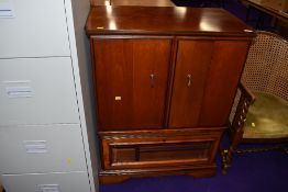 A modern Rossmore or similar TV cabinet