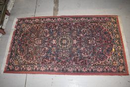 An Abrash woven rug, labelled Izmir, approx 150 x 80cm
