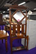 A late 19th/early 20th Century oak hall stand , having diamond mirror section, height approx. 190cm
