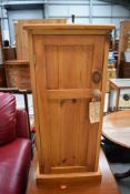 A traditional pine pot cupboard, height approx. 79cm