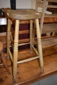 A traditional wood stool, height approx. 70cm