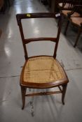 A late Victorian cane seated bedroom chair