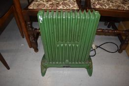 A cute little vintage cast oil filled electric radiator (selling as collectors item so may be