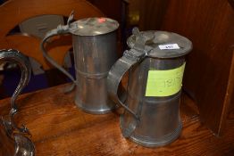 Two large pewter lidded vessels or tankard being stamped Kiniburgh