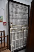 A Victorian style cast and brass single bed