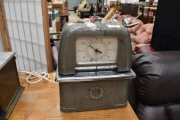 A vintage industrial ITR International time recorders