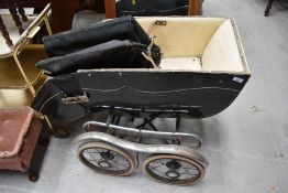 A vintage perambulator pram/push chair