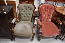 A matched pair of Victorian stained frame 'his and hers' low seat armchairs having button back