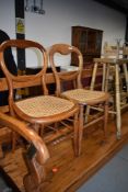 A pair of Victorian cane seated bedroom chairs