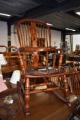 A traditional oak rocking chair, nicely restored