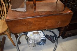 A 19th Century Pembroke style table, having draw to one end and dummy draw to other, on turned