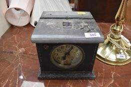 A vintage Blick time recorder clock