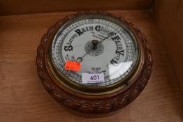 A traditional stained frame barometer , signed James Murison, Renfrew