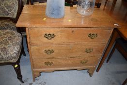 A late 19th/early 20th Century oak three drawer chest, width approx 88cm