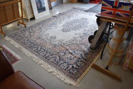 A large traditional carpet square, approx 325 x 230cm