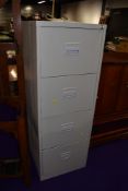 A modern grey 4 drawer filing cabinet