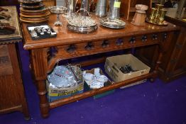 A ecclesiastical church vestibule or console table having gothic design in pitch pine