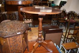 A 19th Century mahogany oval occasional table, on turned column and triple splay legs, width approx.