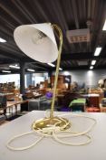 A brass desk or table lamp