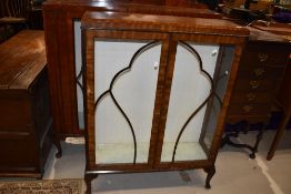 A mid 20th Century walnut display, width approx. 91cm height 120cm