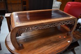 An Oriental hardwood coffee table, approx. 100 x 45cm