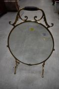 A traditional brass mirrored oval fire screen (previously centre of a triptych but works equally