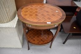 A reproduction Continental style side table with enamel and gilt metal detailing, width approx.