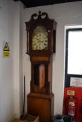 A 19th Century oak and mahogany long case clock, having 8 day movement, with painted arch dial, dual