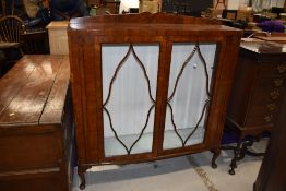 A mid 20th Century mahogany display, width approx. 120cm