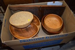 A selection of treen items including Indian folding book rack, fruit bowls and carved footstool