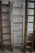 A set of aluminium extending ladders