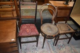 An early 20th Century bentwood chair and two Edwardian bedroom chairs