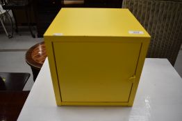 A small yellow cabinet cube, 25cm