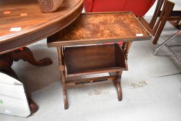 A vintage occasional table/magazine rack