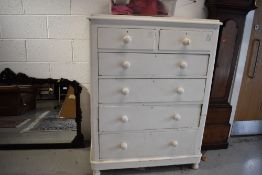 A 19th Century pine painted chest of two over three drawers, splits into two between drawer one