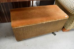 A vintage Lloyd Loom bedding box