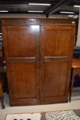 An early 20th Century oak gents compactum wardrobe, lovely proportions approx dimensions W109cm