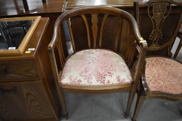 An Edwardian mahogany vase back salon armchair, on square tapered legs and spade feet