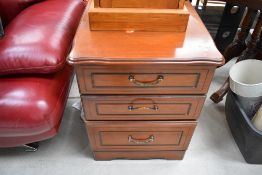 A modern mahogany effect chest of three bedside drawers, width approx. 50cm