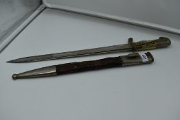 A German WW2 period Police Dagger and scabbard by Paul Weyersberg & Co Solingen, scabbard metal
